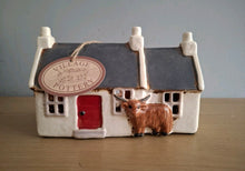 Load image into Gallery viewer, Village Pottery CROFT HOUSE with HIGHLAND COW Tea Light Holder
